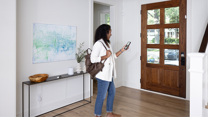 ADT call center employee working and talking into a headset 